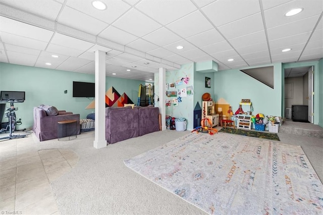 playroom featuring tile patterned floors, a drop ceiling, and recessed lighting