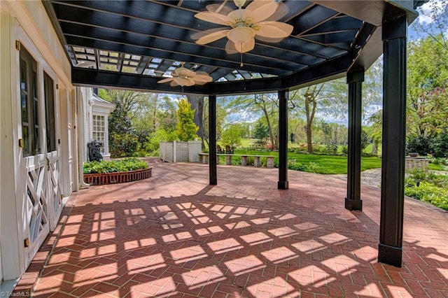 view of patio with a pergola and ceiling fan