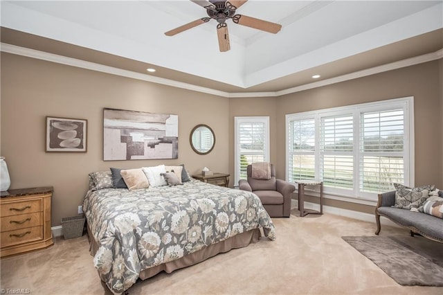 bedroom with light colored carpet, baseboards, and ornamental molding