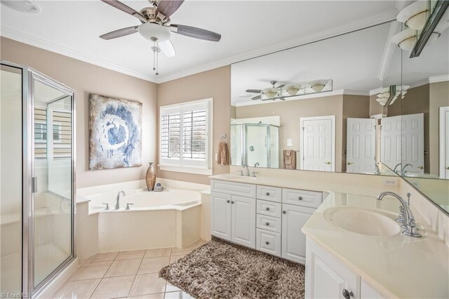 full bath with vanity, a stall shower, ornamental molding, tile patterned flooring, and a garden tub