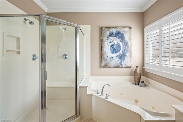 full bathroom featuring a tub with jets, a stall shower, and ornamental molding