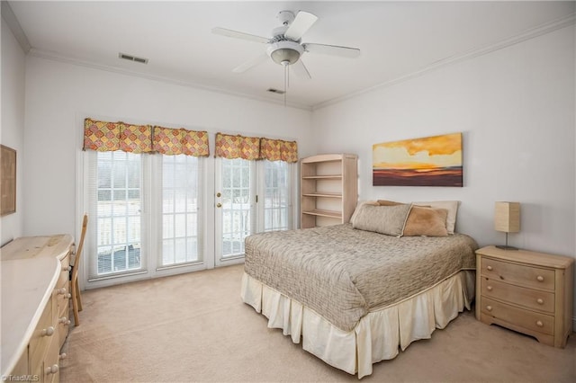 bedroom with visible vents, ornamental molding, access to exterior, light colored carpet, and ceiling fan