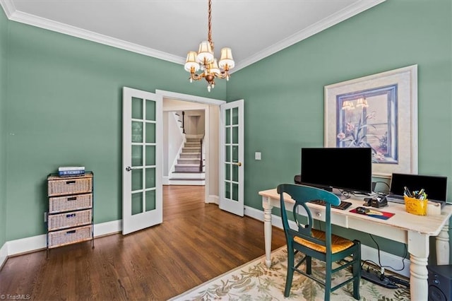 1905 Regents Park Ln, Greensboro, NC 27455 - home office with french doors, crown molding, baseboards, a chandelier, and wood finished floors