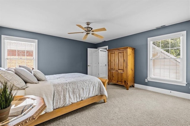 1905 Regents Park Ln, Greensboro, NC 27455 - bedroom featuring baseboards, carpet, and ceiling fan