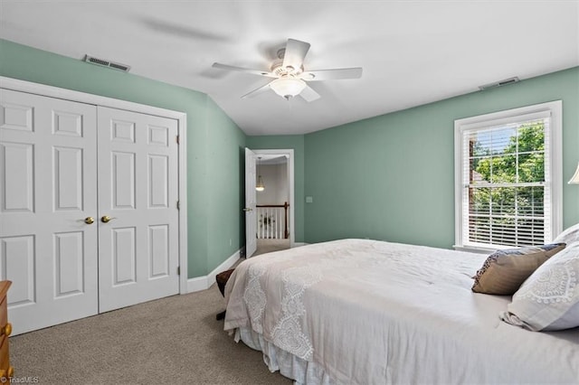 1905 Regents Park Ln, Greensboro, NC 27455 - bedroom with carpet floors, a closet, a ceiling fan, and baseboards
