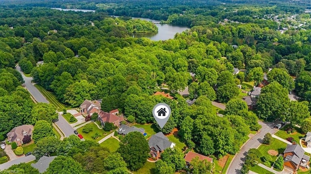 1905 Regents Park Ln, Greensboro, NC 27455 - drone / aerial view of a nearby body of water and a forest