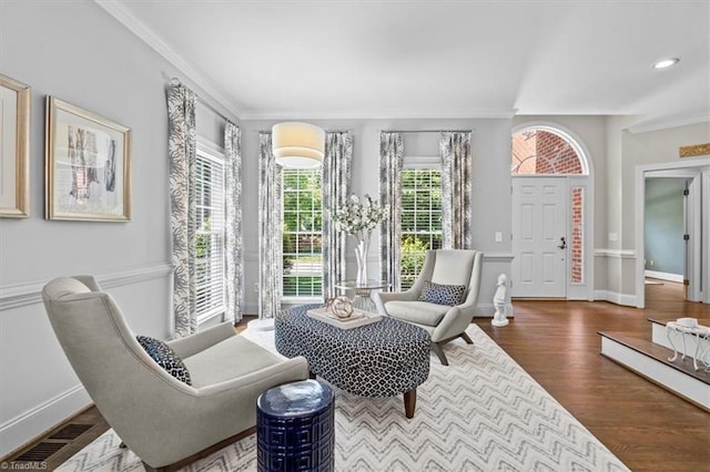 1905 Regents Park Ln, Greensboro, NC 27455 - sitting room featuring ornamental molding, wood finished floors, and baseboards