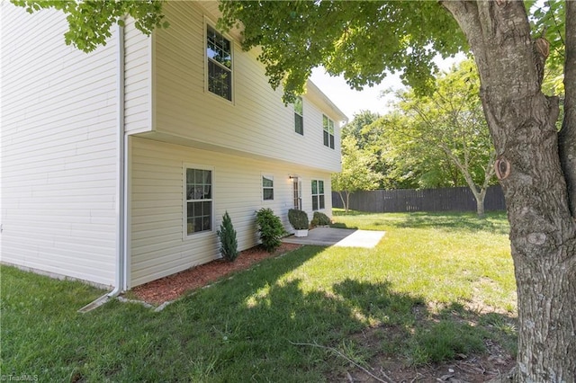 back of house with a patio