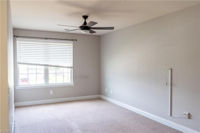 4008 Meadow Valley Dr, High Point, NC 27265 - spare room featuring baseboards, ceiling fan, and carpet flooring