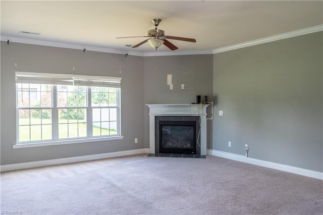 4008 Meadow Valley Dr, High Point, NC 27265 - unfurnished living room with a ceiling fan, baseboards, carpet flooring, crown molding, and a tiled fireplace