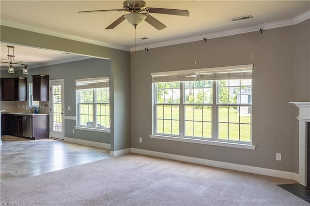 4008 Meadow Valley Dr, High Point, NC 27265 - unfurnished living room with light carpet, baseboards, a ceiling fan, a sink, and ornamental molding