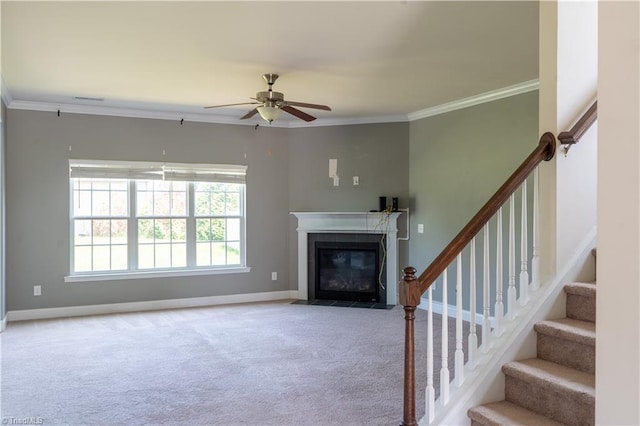 4008 Meadow Valley Dr, High Point, NC 27265 - unfurnished living room featuring carpet floors, crown molding, a ceiling fan, a fireplace, and stairs