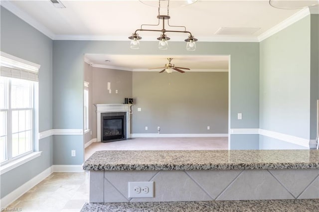 4008 Meadow Valley Dr, High Point, NC 27265 - unfurnished living room featuring ceiling fan, crown molding, a tile fireplace, and baseboards
