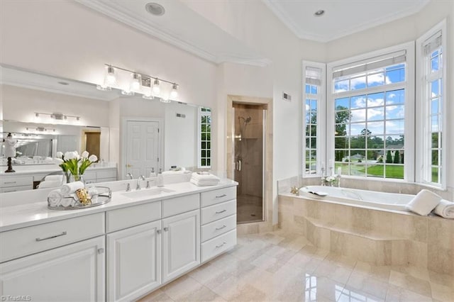 full bath featuring a bath, a wealth of natural light, a shower stall, and crown molding