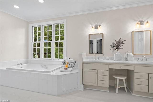 bathroom featuring a garden tub, double vanity, ornamental molding, and a sink