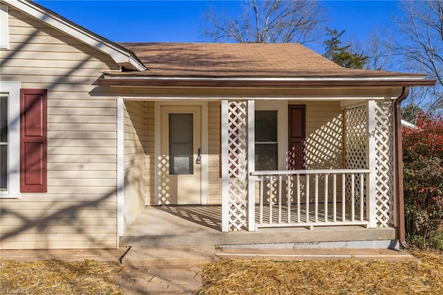 property entrance featuring covered porch