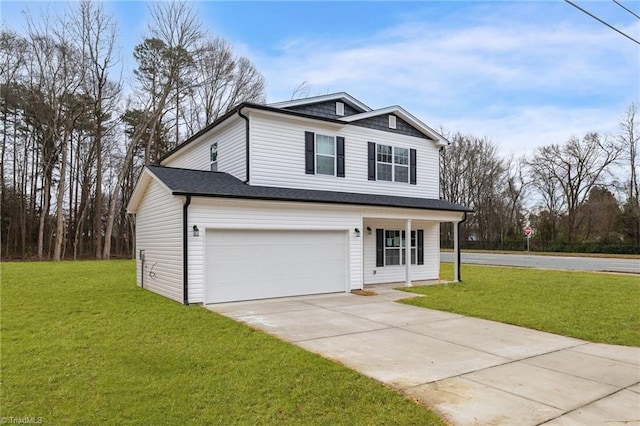 view of front facade featuring a front yard and a garage