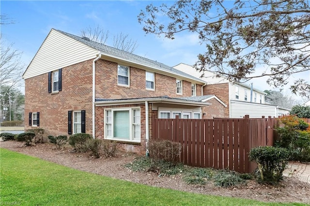 3905 Valley Ct Unit F, Winston-Salem, NC 27106 - view of property exterior featuring brick siding