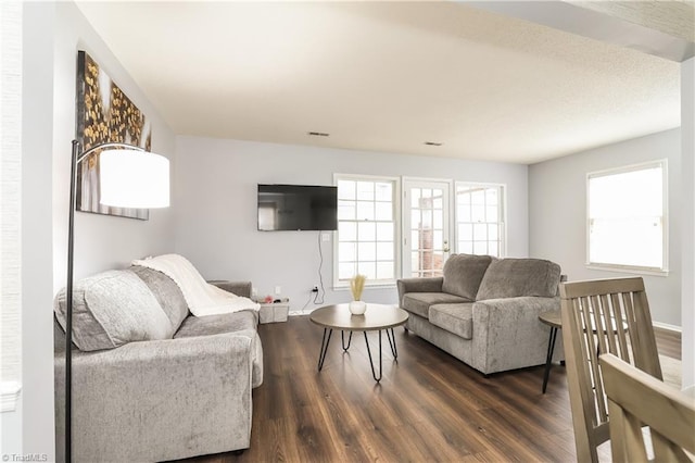 3905 Valley Ct Unit F, Winston-Salem, NC 27106 - living room featuring dark wood-style flooring and baseboards