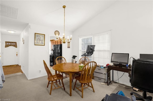 carpeted dining area with a notable chandelier and vaulted ceiling