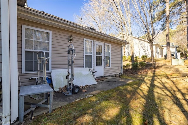 view of side of property featuring a yard