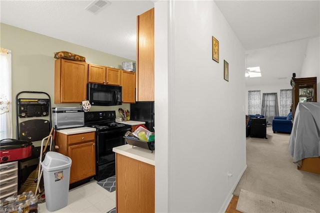 kitchen with black appliances