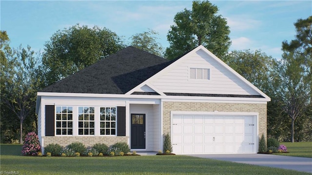 view of front of property featuring a garage and a front lawn