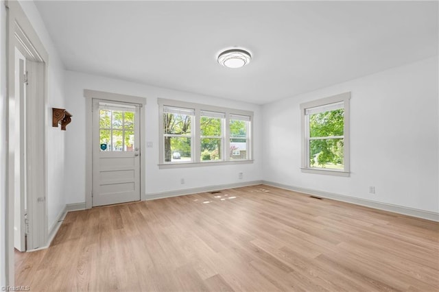 502 Eighth St, Mebane, NC 27302 - foyer featuring light wood-style flooring and baseboards