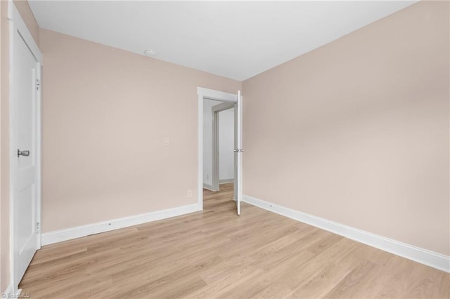 502 Eighth St, Mebane, NC 27302 - unfurnished room with light wood-style flooring and baseboards