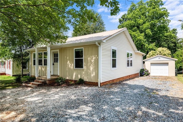 502 Eighth St, Mebane, NC 27302 - single story home with driveway, an outbuilding, board and batten siding, and a garage