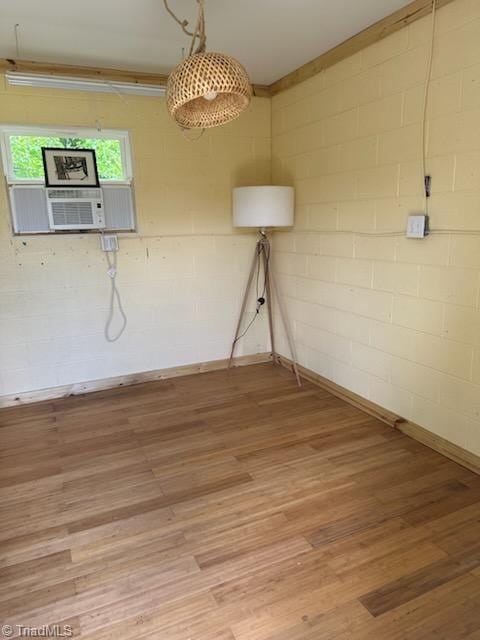502 Eighth St, Mebane, NC 27302 - unfurnished dining area with light wood-style floors and cooling unit