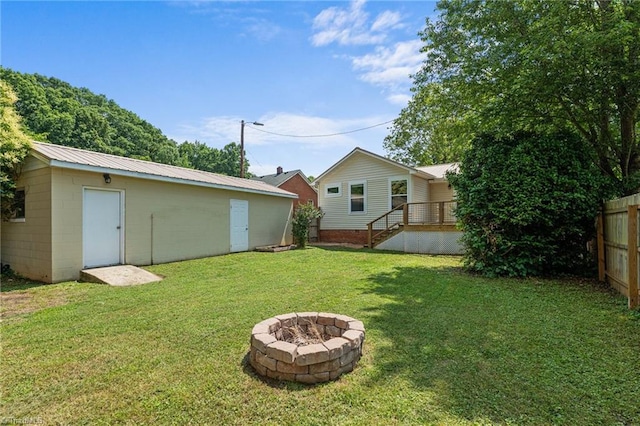 502 Eighth St, Mebane, NC 27302 - view of yard featuring an outdoor fire pit, an outdoor structure, stairs, and a deck