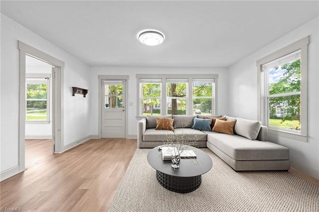 502 Eighth St, Mebane, NC 27302 - living area featuring plenty of natural light and light wood-style flooring