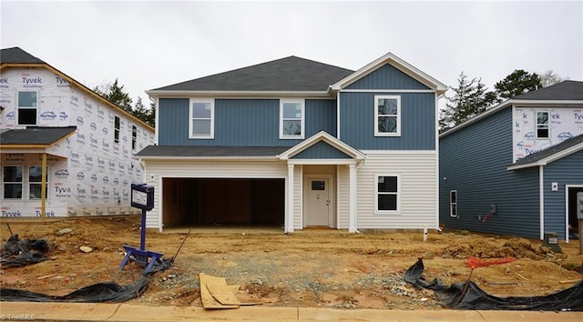 2207 Cherry Creek Rd, Haw River, NC 27258 - view of front of home with a garage and driveway