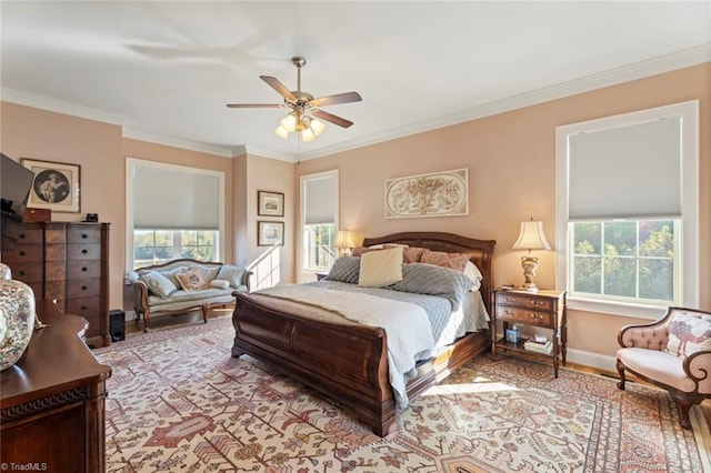 bedroom featuring crown molding and ceiling fan