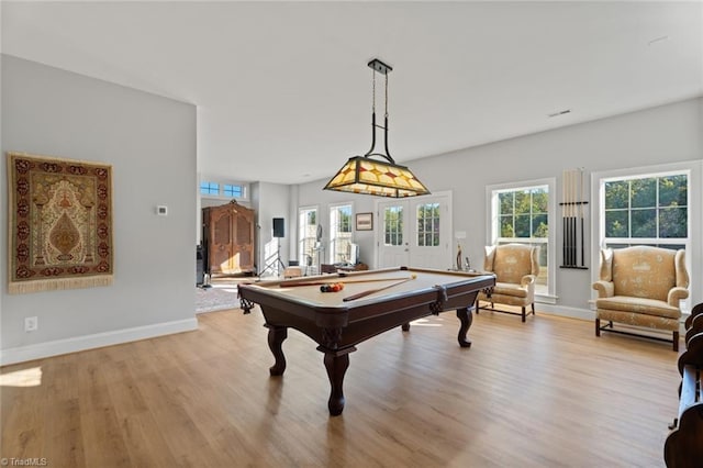 playroom with light hardwood / wood-style flooring and billiards