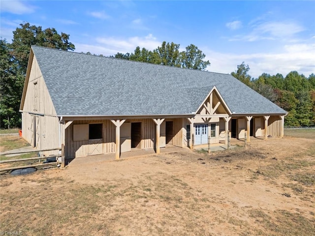 view of front of home featuring an outbuilding