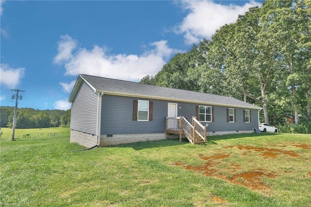 view of front facade featuring a front lawn