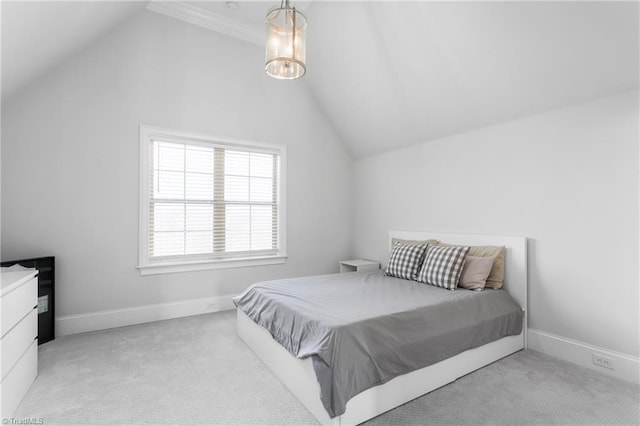 carpeted bedroom featuring vaulted ceiling