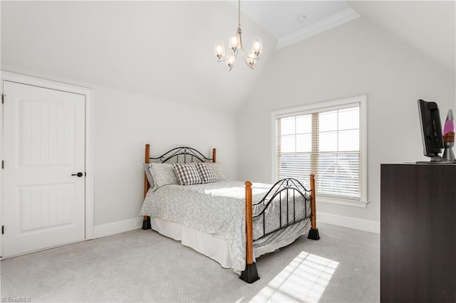 carpeted bedroom featuring an inviting chandelier and vaulted ceiling