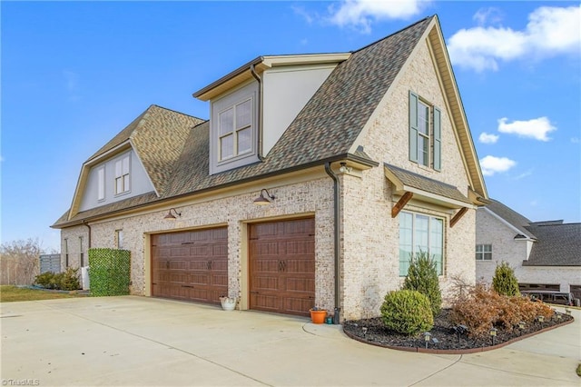 view of property exterior featuring a garage