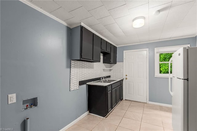 415 White Oak St, High Point, NC 27260 - washroom featuring hookup for a washing machine, crown molding, and light tile patterned flooring