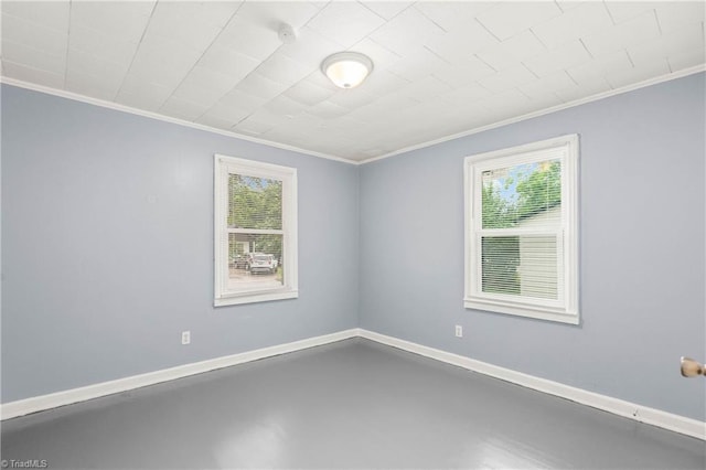 415 White Oak St, High Point, NC 27260 - spare room with crown molding, concrete flooring, and a smoke detector