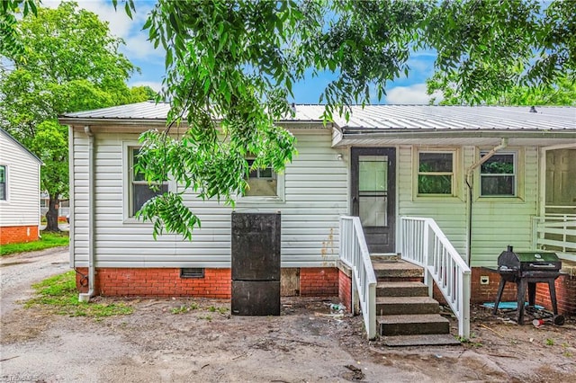 415 White Oak St, High Point, NC 27260 - view of front of home featuring crawl space and a metal roof