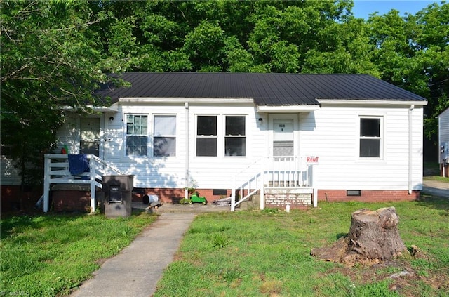 415 White Oak St, High Point, NC 27260 - bungalow featuring crawl space, a front lawn, and metal roof