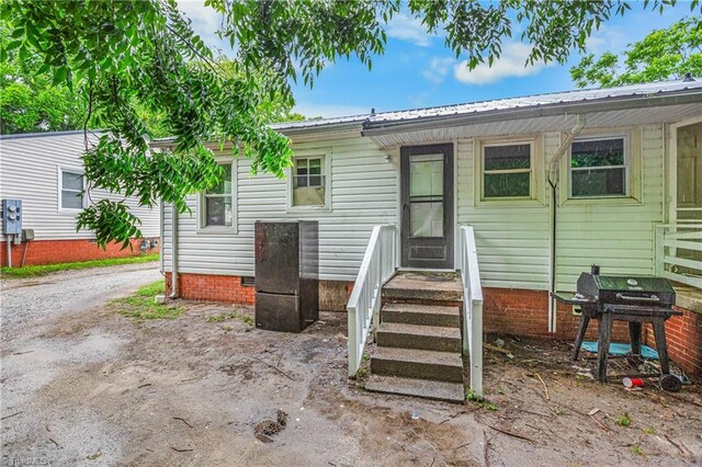415 White Oak St, High Point, NC 27260 - view of front of property with crawl space and a metal roof