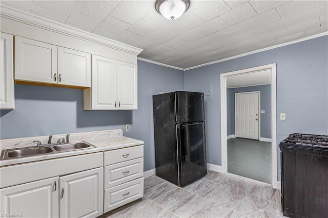 415 White Oak St, High Point, NC 27260 - kitchen with black appliances, ornamental molding, light countertops, and white cabinets