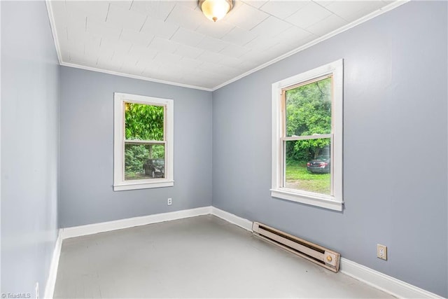 415 White Oak St, High Point, NC 27260 - spare room featuring a baseboard heating unit, crown molding, and finished concrete floors
