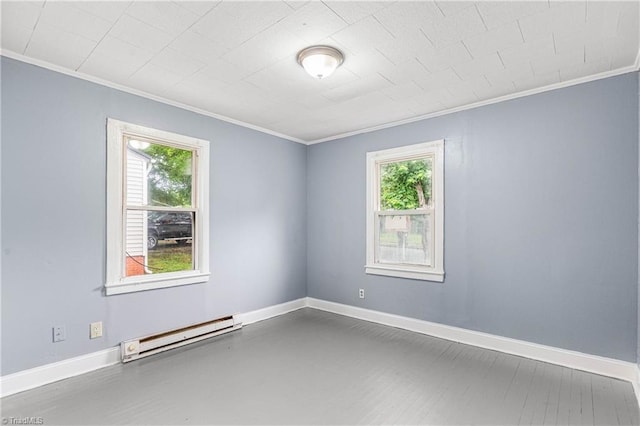 415 White Oak St, High Point, NC 27260 - unfurnished room featuring baseboard heating, ornamental molding, and plenty of natural light