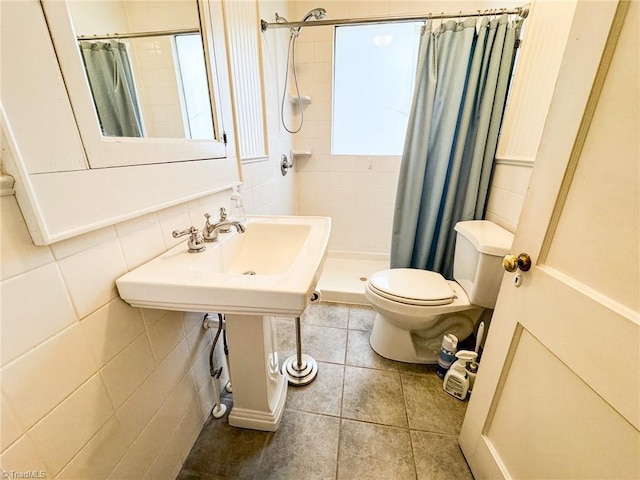 1610 S Main St, Mount Airy, NC 27030 - full bathroom featuring toilet, a stall shower, and tile patterned floors